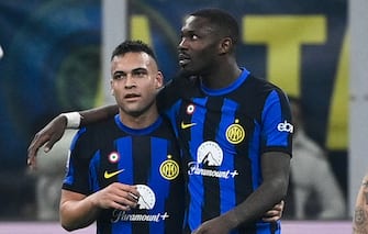 MILAN, ITALY - FEBRUARY 4: (L-R) Lautaro Martinez  of Internazionale FC and Marcus Thuram of Internazionale FC  celebrates a goal during the Serie A TIM match between FC Internazionale and Juventus - Serie A TIM  at Stadio Giuseppe Meazza on February 4, 2024 in Milan, Italy. (Photo by Stefano Guidi/Getty Images)