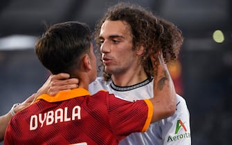 RomaÕs Paulo Dybala (L) discusses with Lazio's Matteo Guendouzi (R) during the Serie A soccer match between AS Roma and SS Lazio at the Olimpico stadium in Rome, Italy, 6 April 2024. ANSA/RICCARDO ANTIMIANI