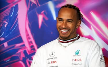 epa11118614 British Formula One driver Lewis Hamilton of Mercedes-AMG Petronas smiles during a press conference for the Canada Formula One Grand Prix at the Gilles Villeneuve circuit in Montreal, Canada, 17 June 2022 (reissued 01 February 2024). British driver Lewis Hamilton will leave Mercedes-AMG Petronas after the upcoming 2024 season and sign with Scuderia Ferrari from 2025 on. The 39-year-old seven-times world champion's move was announced by Scuderia Ferrari in a statement on 01 February 2024.  EPA/ANDRE PICHETTE