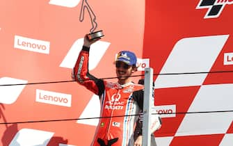 Pramac Racing's Italian rider Francesco Bagnaia celebrates on the podium after his second place at the San Marino MotoGP Grand Prix at the Misano World Circuit Marco Simoncelli on September 13, 2020. ANSA/PASQUALE BOVE