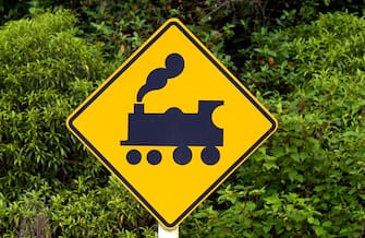 NORTH ISLAND, NEW ZEALAND - DECEMBER 11:  Road traffic sign look out for trains on railway crossing, North Island, New Zealand.  (Photo by Tim Graham/Getty Images)