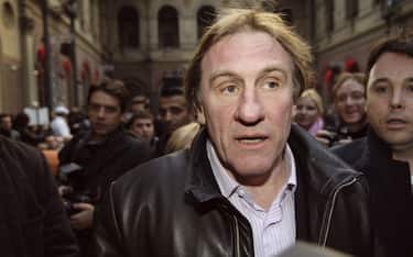 File photo - "French actor Gerard Depardieu attends Francesco Smalto's men Fall-Winter 2006-2007 collection presentation held at ""L'Ecole des Beaux-Arts"" in Paris, France, January 30, 2006. French actor Gerard Depardieu has been charged with rape and sexual assault allegedly committed in 2018 against an actress in her 20s. The 72-year-old is alleged to have repeatedly attacked the young woman   who cannot be named for legal reasons   over a number of days in August 2018. Photo by Nicolas Gouhier/ABACAPRESS.COM"