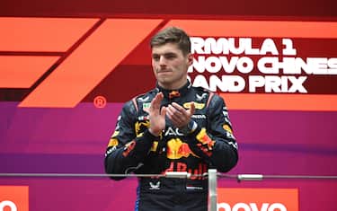 SHANGHAI INTERNATIONAL CIRCUIT, CHINA - APRIL 21: Max Verstappen, Red Bull Racing, 1st position, on the podium during the Chinese GP at Shanghai International Circuit on Sunday April 21, 2024 in Shanghai, China. (Photo by Mark Sutton / Sutton Images)