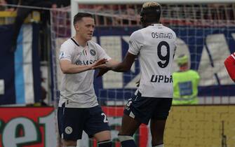 SSC Napoli's midfielder Piotr Zielinski celebrates his goal with SSC Napoli's forward Victor Osimhen during the Italian Serie A soccer match between AC Monza and SSC Napoli at U-Power Stadium in Monza, Italy, 07 April 2024. ANSA / ROBERTO BREGANI