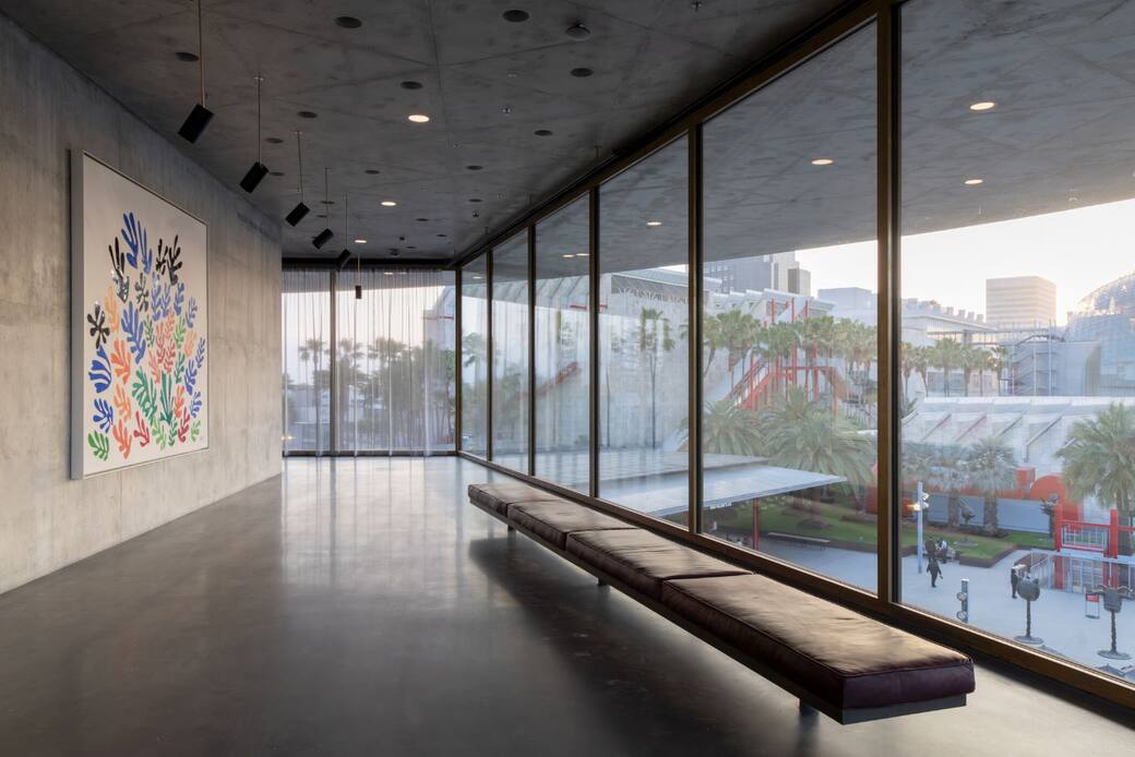 View southwest from exhibition level toward Resnick Pavilion and BCAM with Henri Matisse’s La Gerbe (1953) at left, David Geffen Galleries at LACMA, art © 2012 Succession H. Matisse/Artists Rights Society (ARS), New York, NY, photo © Iwan Baan