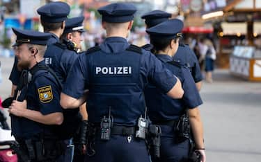 17 September 2023, Bavaria, Munich: Police officers stand on the festival grounds. The 188th Wiesn will take place this year from 16.09.- 03.10.2023. Photo: Sven Hoppe/dpa (Photo by Sven Hoppe/picture alliance via Getty Images)