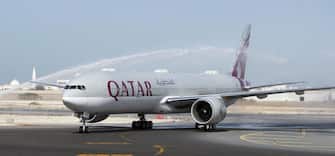The first-ever Boeing aircraft 777 delivered to the state-owned Qatar Airways stands on the runway at Doha airport, 29 November 2007. Earlier this month, the rapidly expanding airline ordered from the US aircraft manufacturer 30 Boeing 787 Dreamliners and five 777 cargo planes in a deal valued at over 6.1 billion dollars at list prices. AFP PHOTO/STR (Photo credit should read -/AFP via Getty Images)