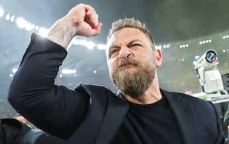 Daniele De Rossi head coach of Roma celebrates the victory at the end of the UEFA Europa League play off second leg soccer match between AS Roma and Feyenoord at Stadio Olimpico in Rome, Italy, 22 February 2024. ANSA/FEDERICO PROIETTI