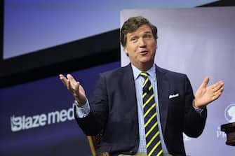 DES MOINES, IOWA - JULY 14: Former Fox News television personality Tucker Carlson speaks to guests at the Family Leadership Summit on July 14, 2023 in Des Moines, Iowa. The event, which is expected to draw several Republican presidential candidates, is billed as â  The Midwestâ  s largest gathering of Christians seeking cultural transformation in the family, Church, government, and more.â   (Photo by Scott Olson/Getty Images)