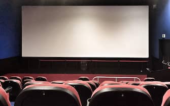 Empty cinema with blank screen