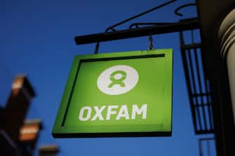 LONDON, ENGLAND - DECEMBER 08: A sign outside a branch of an Oxfam book shop on December 08, 2023 in London, England. Employees of the charity shop who are members of the Unite union rejected the latest pay offer and have started a 17-day strike to last through Christmas. The union said that around 500 workers would strike, affecting 200 shops, representing the first strike in the charity's 81-year history. (Photo by Dan Kitwood/Getty Images)