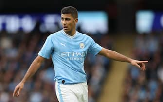 epa10930887 Rodri of Manchester City reacts during the English Premier League match between Manchester City and Brighton & Hove Albion in Manchester, Britain, 21 October 2023.  EPA/ADAM VAUGHAN No use with unauthorized audio, video, data, fixture lists, club/league logos, 'live' services' or as NFTs. Online in-match use limited to 120 images, no video emulation. No use in betting, games or single club/league/player publications.