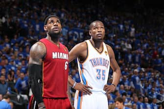 OKLAHOMA CITY, OK - June 12:  LeBron James #6 of the Miami Heat and Kevin Durant #35 of the Oklahoma City Thunder during Game One of the 2012 NBA Finals at Chesapeake Energy Arena on June 12, 2012 in Oklahoma City, Oklahoma. NOTE TO USER: User expressly acknowledges and agrees that, by downloading and or using this Photograph, user is consenting to the terms and conditions of the Getty Images License Agreement. Mandatory Copyright Notice: Copyright 2012 NBAE (Photo by Nathaniel S. Butler /NBAE via Getty Images)