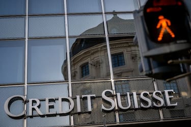 A picture taken on October 25, 2022 shows a sign of Switzerland's second-biggest bank Credit Suisse on a branch in Basel. - New Credit Suisse chief executive, faced with trying to turn around the beleaguered bank following multiple scandals, is set to unveil his strategic road map on October 27, 2022 as the pressure is on for Switzerland's second-biggest bank after investors saw their money go up in smoke due to the collapse in share prices. (Photo by Fabrice COFFRINI / AFP) (Photo by FABRICE COFFRINI/AFP via Getty Images)
