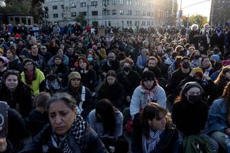 NEW YORK, NEW YORK - APRIL 23: Jews and supporters hold a Passover Seder to protest the war in Gaza on April 23, 2024 in the Brooklyn borough of New York City. The event, which resulted in dozens of arrests, was held blocks from the residence of U.S. Sen. Chuck Schumer (D-NY). Schumer is a longtime supporter of Israel but has recently criticized President Benjamin Netanyahu for Israel's conduct in the war. (Photo by Andrew Lichtenstein/Corbis via Getty Images)