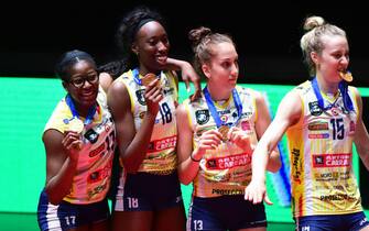 VERONA, ITALY - MAY 01:  (L-R) Miriam Sylla, Paola Egonu, Giulia Gennari and Hill Kimberly of Imoco Conegliano Volley celebrate during the Volleyball European Champions League Men and Women awards ceremony Match for 1st and 2nd place between Trentino Itas and Grupa Azoty Kedzierzyn-Kozle at AGSM Forum on May 1, 2021 in Verona, Italy.  (Photo by Pier Marco Tacca/Getty Images)