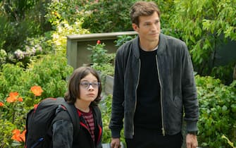 Your Place or Mine (2023), Wesley Kimmel as Jack, Ashton Kutcher as Peter. Cr Erin Simkin / Netflix