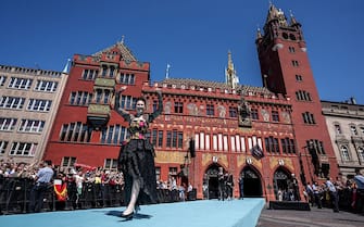 2213977904 Swiss singer Zoe Me representing Switzerland with the song "Voyage" arrives on the turquoise carpet next to the Basel Town Hall during the opening ceremony of the Eurovision Song Contest 2025 in Basel on May 11, 2025. (Photo by Fabrice COFFRINI / AFP) (Photo by FABRICE COFFRINI/AFP via Getty Images)