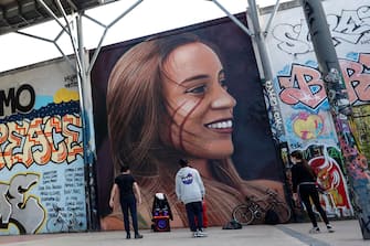 Mural, outside the former SNIA Viscosa factory, by the street artist Jorit Agoch which portrays depicting Luana D'Orazio, a 22-year-old girl who died while working in a textile company near Prato, in Rome, Italy, 7 May 2021.  ANSA/GIUSEPPE LAMI