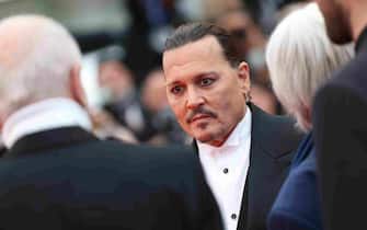 CANNES, FRANCE - MAY 16: Johnny Depp attends the "Jeanne du Barry" Screening & opening ceremony red carpet at the 76th annual Cannes film festival at Palais des Festivals on May 16, 2023 in Cannes, France. (Photo by Vittorio Zunino Celotto/Getty Images)