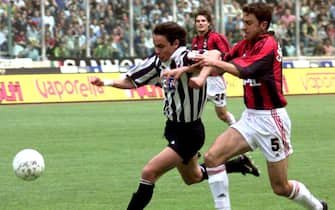 Filippo Inzaghi e Alessandro Costacurta in un' azione di gioco durante Juventus-Milan il 9 maggio 1999. ANSA / D'ALBERTO 
