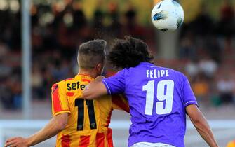 Swiss forward Haris Seferovic (L) of US Lecce struggles for the ball with Brazilian defender Felipe of Acf Fiorentina during their Italian Serie A soccer match against at 'Via del Mare' Stadium in Lecce, 5 May 2012. ANSA/DARIO CARICATO