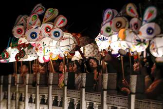HUANGSHAN, CHINA - SEPTEMBER 28: People parade with rabbit-shaped lanterns at Hongcun Village to welcome the upcoming Mid-Autumn Festival on September 28, 2023 in Huangshan City, Anhui Province of China. (Photo by Shi Yalei/VCG via Getty Images)