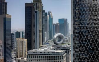 This picture taken on June 30, 2021 shows a view of the Museum of the Future, currently under construction, and skyscrapers along the Sheikh Zayed Road in the gulf emirate of Dubai. (Photo by Karim SAHIB / AFP) (Photo by KARIM SAHIB/AFP via Getty Images)