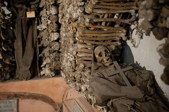 ROME, ITALY - JUNE 26:  The mummy of a Capuchin monk is seen in the crypt during the opening of the museum in the Capuchin convent of the Immaculate Conception of the Blessed Virgin Mary on June 26, 2012 in Rome, Italy. The monastery, which was first used by Capuchin monks and nuns in 1626, has become a destination for tourists from all over the world who visit an ossuary in the crypt which contains the skeletal remains of 3,700 monks.  (Photo by Giorgio Cosulich/Getty Images)