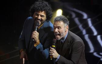 Italian singers Francesco Renga (L) and Nek (R) perform on stage at the Ariston theater during the 74th Sanremo Italian Song Festival in Sanremo, Italy, 07 February 2024. The music festival runs from 06 to 10 February 2024. ANSA/RICCARDO ANTIMIANI
