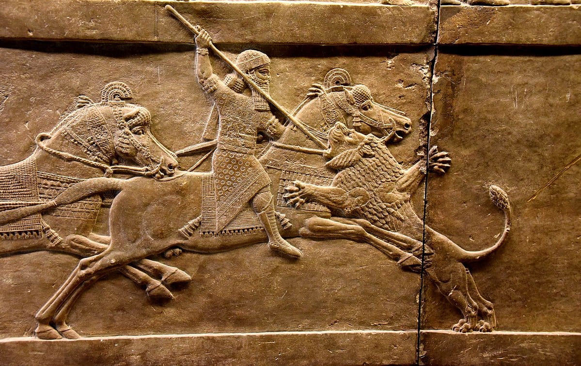 Assyrian-king-Ashurbanipal-on-his-horse-thrusting-a-spear-onto-a-lion’s-head-645-635-BCE-British-Museum-in-London.jpg