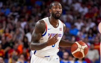 Davon Reed (L) of Puerto Rico in action against Rudy Fernandez (R) of Spain during the Basketball International Friendly match between Spain and Puerto Rico at WiZink Center on July 23, 2024 in Madrid, Spain.