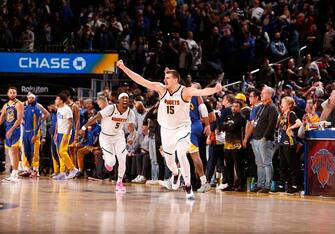 SAN FRANCISCO, CA - JANUARY 4: Nikola Jokic #15 of the Denver Nuggets celebrates after making the game winning three point basket against the Golden State Warriors on January 4, 2024 at Chase Center in San Francisco, California. NOTE TO USER: User expressly acknowledges and agrees that, by downloading and or using this photograph, user is consenting to the terms and conditions of Getty Images License Agreement. Mandatory Copyright Notice: Copyright 2024 NBAE (Photo by Jed Jacobsohn/NBAE via Getty Images)