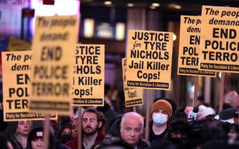 epa10434956 People gather for a protest following the release of video footage showing the encounter earlier this month between Tyre Nichols, 29, and five Memphis police officers which resulted in Nichols' beating and subsequent death, in New York, New York, USA, 27 January 2023. Nichols, who was stopped by Memphis police on 7 January 2023 for reckless driving, died three days after the incident from injuries sustained when the officers involved, who have all been fired and charged with murder, beat him after his arrest.  EPA/JUSTIN LANE