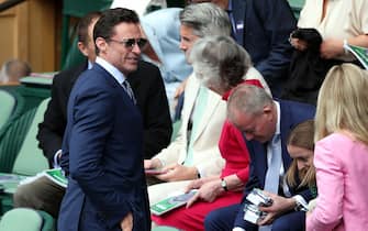 epa11475764 Australian actor Hugh Jackman (CL) attends the Women's final match Barbora Krejcikova of Czech Republic against Jasmine Paolini of Italy at the Wimbledon Championships, Wimbledon, Britain, 13 July 2024.  EPA/ADAM VAUGHAN  EDITORIAL USE ONLY EDITORIAL USE ONLY