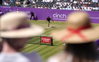 Spectators in the stands watch Matteo Berrettini in action on day four of the cinch Championships at The Queen's Club, London. Picture date: Thursday June 16, 2022.