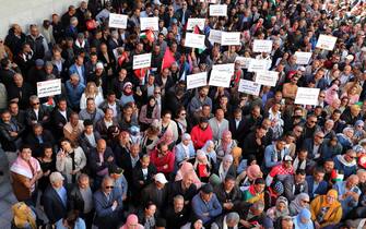 epa11312295 Members of the Tunisian General Labour Union (UGTT) attend a demonstration to mark International Labor Day in Tunis, Tunisia, 01 May 2024. Labor Day, or May Day, is observed all over the world on the first day of May to celebrate the economic and social achievements of workers and fight for laborers.  EPA/MOHAMED MESSARA