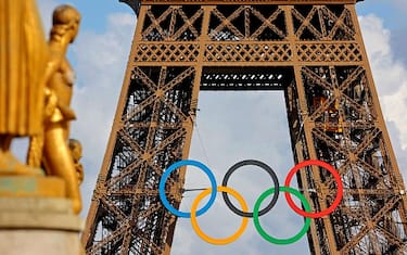 PARIS, FRANCE - JUNE 22: The Olympic rings are displayed on the first floor of the Eiffel Tower ahead of the start of the Paris 2024 Olympic and Paralympic Games on June 22, 2024 in Paris, France. For the Olympic Games, the city of Paris expects to welcome 11.3 million visitors, with the majority coming from France.The city is gearing up to host the XXXIII Olympic Summer Games, from 26 July to 11 August. (Photo by Chesnot/Getty Images)