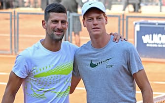 Novak Djokovic of Serbia (L) and Jannik Sinner of Italy pose before a training session at the Italian Open tennis tournament in Rome, Italy, 09 May 2023.  ANSA/ETTORE FERRARI 