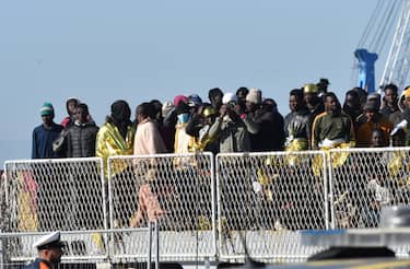 250 migrants from the hotspot on the island of Lampedusa disembark from the Navy ship Vega in the port of Catania, Italy, April 27, 2023. 
ANSA/ORIETTA SCARDINO