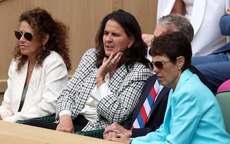 epa11475759 Former Spanish tennis player Conchita Martinez (C) attends the Women's final match Barbora Krejcikova of Czech Republic against Jasmine Paolini of Italy at the Wimbledon Championships, Wimbledon, Britain, 13 July 2024.  EPA/ADAM VAUGHAN  EDITORIAL USE ONLY EDITORIAL USE ONLY