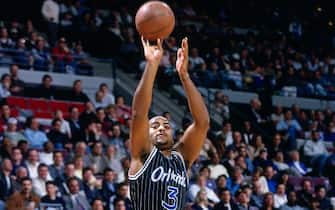 AUBURN HILLS, MI - 1996: Dennis Scott #3 of the Orlando Magic shoots  circa 1996 at the Palace of Auburn Hills in Auburn Hills, Michigan. NOTE TO USER: User expressly acknowledges and agrees that, by downloading and or using this photograph, User is consenting to the terms and conditions of the Getty Images License Agreement. Mandatory Copyright Notice: Copyright 1996 NBAE (Photo by Steve Woltmann/NBAE via Getty Images)