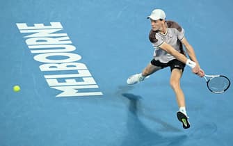 epa11110233 Jannik Sinner of Italy in action during the Menâ  s Singles final against Daniil Medvedev of Russia on Day 15 of the Australian Open tennis tournament in Melbourne, Australia, 28 January 2024.  EPA/JAMES ROSS AUSTRALIA AND NEW ZEALAND OUT