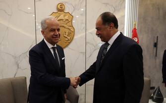 epa10629465 Italian Interior Minister Matteo Piantedosi (L) shake hands with Tunisian Interior Minister Kamel Fekih (R) upon his arrival at the airport in Tunis, Tunisia, 15 May 2023. Italian Interior Minister Matteo Piantedosi is on an official visit to Tunisia.This visit comes as Tunisia suffers from the increase in migratory flows.  EPA/MOHAMED MESSARA