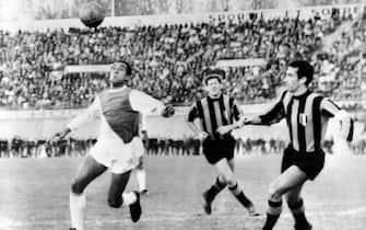 French footballer Lucien Cossou of AS Monaco fights for the ball against the players of the Internazionale at the Stade Vélodrom, on December 4, 1963 in Marseille during the 196263 European Cup. Inter Milan qualified for the Quarter-finals. (Photo by - / AFP) (Photo by -/AFP via Getty Images)
