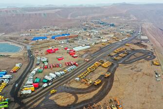 epa10484824 An aerial view of rescue vehicles near the site of a collapsed coal mine in Alxa League, north China's Inner Mongolia Autonomous Region, 23 February 2023. The landslide occurred at the rescue site at around 6 p.m. China Standard Time (CST) on 22 February, according to the rescue headquarters. As of 23 February, more than 900 people had rushed to the site for rescue operations after an open-pit mine collapsed in Alxa Left Banner at around 1 p.m. CST on 22 February, resulting in two deaths, six injuries, and 53 people missing.  EPA/XINHUA/LIAN ZHEN CHINA OUT / MANDATORY CREDIT  EDITORIAL USE ONLY