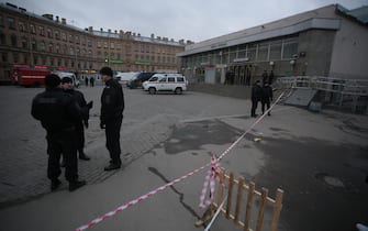 SAINT-PETERSBURG, RUSSIA - APRIL 3: Police officers take security measures near the area after an explosion at a subway station in St Petersburg, Russia on April 3, 2017. A blast hit a train carriage between Sennaya Ploschad and Tekhnologichesky Institut stations of the St Petersburg Underground on April 3, 2017, killing at least 10 and injuring 47 people. (Photo by Sergey Mihailicenko/Anadolu Agency/Getty Images)