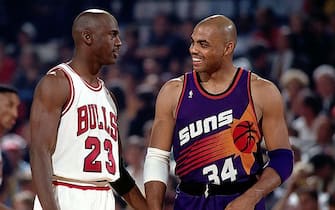 CHICAGO - JUNE 18:  Michael Jordan #23 of the Chicago Bulls talks to Charles Barkley #34 of the Phoenix Suns during Game Five of the 1993 NBA Championship Finals at Chicago Stadium on June 18, 1993 in Chicago, Illinois.  The Suns won 108-98, sending them home to Phoenix with 2 games to 3.  NOTE TO USER: User expressly acknowledges and agrees that, by downloading and/or using this Photograph, User is consenting to the terms and conditions of the Getty Images License Agreement  Mandatory Copyright Notice:  Copyright 1993 NBAE   (Photo by Andrew D. Bernstein/NBAE via Getty Images)