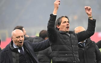 Inter's coach Simone Inzaghi (R) and CEO Giuseppe Marotta celebrate at the end of the Italian Serie A soccer match between Ac Milan and Inter Milan at the Giuseppe Meazza stadium in Milan, Italy, 22 April 2024. ANSA/DANIEL DAL ZENNARO
