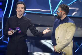 Italian singers Dargen D'Amico (R) and Diodato (L) on stage at the Ariston theatre during the 74th Sanremo Italian Song Festival in Sanremo, Italy, 07 February 2024. The music festival runs from 06 to 10 February 2024.   ANSA/RICCARDO ANTIMIANI